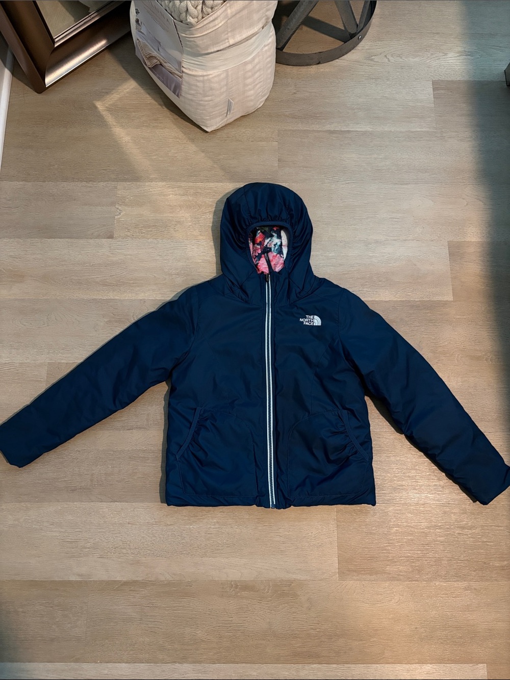 The North Face Kids Navy Blue Reversible Puffer Jacket with Floral Hood Lining